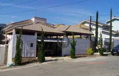 Imagem: A casa possui 5 Dormitórios, 5 Banheiros, 5 Vagas na garagem