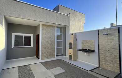 Imagem: A casa possui 2 Dormitórios, 2 Banheiros, 3 Vagas na garagem