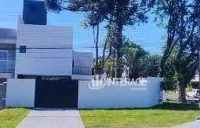 Imagem: A casa possui 3 Dormitórios, 3 Banheiros, 2 Vagas na garagem