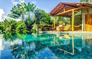 Imagem: A casa possui 5 Dormitórios, 5 Banheiros, 5 Vagas na garagem