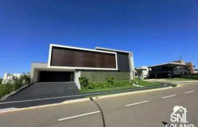 Imagem: A casa em condomínio possui 4 Dormitórios, 5 Banheiros, 4