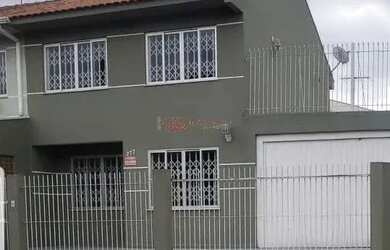 Imagem: A casa possui 3 Dormitórios, 3 Banheiros, 1 Vaga na garagem