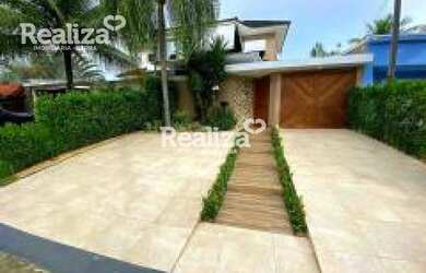 Imagem: A casa em condomínio possui 5 Dormitórios, 5 Banheiros, 3