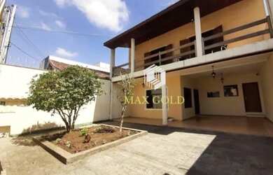 Imagem: A casa possui 4 Dormitórios, 4 Banheiros, 4 Vagas na garagem