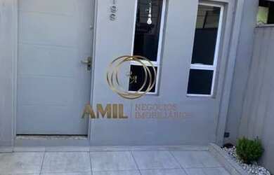 Imagem: A casa possui 2 Dormitórios, 1 Banheiro, 1 Vaga na garagem