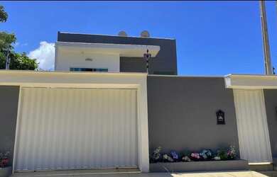 Imagem: A casa possui 3 Dormitórios, 4 Banheiros, 4 Vagas na garagem