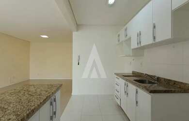 Imagem 12: Apartamento composto por 02 quartos, sendo 01 suíte, sala de estar e jantar, cozinha com a