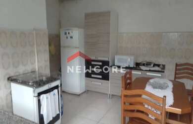 Imagem: A casa possui 3 Dormitórios, 4 Banheiros, 2 Vagas na garagem