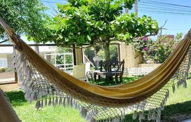 Imagem: A casa possui 4 Dormitórios, 4 Banheiros e está localizado