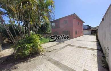 Imagem: A casa possui 5 Dormitórios, 2 Banheiros, 5 Vagas na garagem