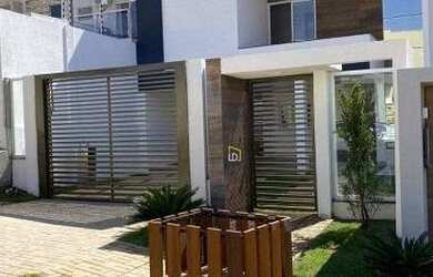 Imagem: A casa possui 3 Dormitórios, 2 Banheiros, 2 Vagas na garagem