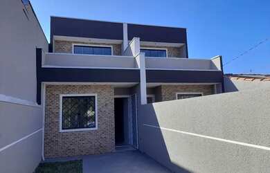 Imagem: A casa possui 3 Dormitórios, 2 Banheiros, 2 Vagas na garagem