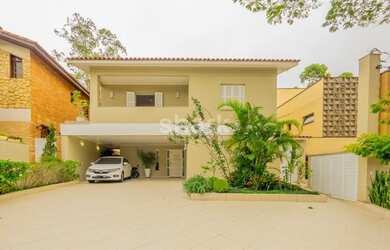 Imagem: A casa em condomínio possui 4 Dormitórios, 5 Banheiros, 4