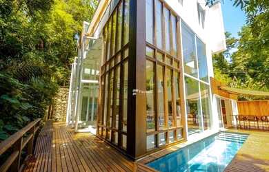 Imagem: A casa em condomínio possui 5 Dormitórios, 5 Banheiros, 5