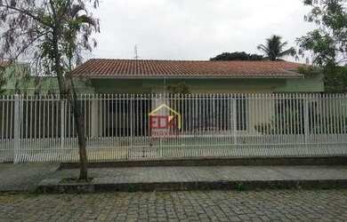 Imagem: A casa possui 3 Dormitórios, 4 Banheiros, 2 Vagas na garagem