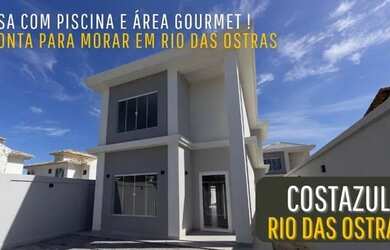 Imagem: A casa possui 4 Dormitórios, 5 Banheiros, 2 Vagas na garagem