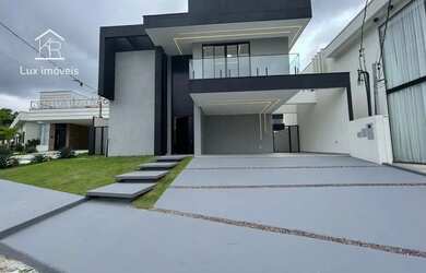 Imagem: A casa em condomínio possui 5 Dormitórios, 5 Banheiros, 4