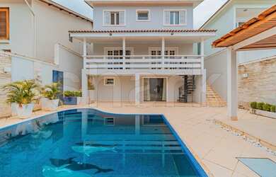 Imagem: A casa em condomínio possui 3 Dormitórios, 4 Banheiros, 4