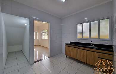 Imagem: A casa possui 2 Dormitórios, 2 Banheiros, 1 Vaga na garagem