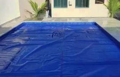 Imagem: A casa possui 4 Dormitórios, 4 Banheiros, 4 Vagas na garagem