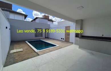 Imagem: A casa possui 3 Dormitórios, 4 Banheiros e 2 Vagas na garagem