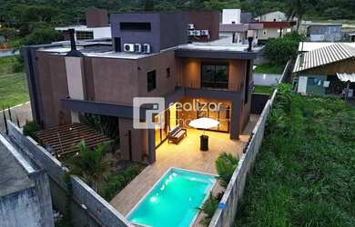 Imagem: A casa em condomínio possui 3 Dormitórios, 4 Banheiros, 4