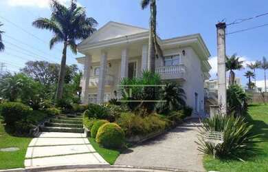 Imagem: A casa em condomínio possui 5 Dormitórios, 5 Banheiros, 5