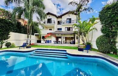 Imagem: A casa em condomínio possui 4 Dormitórios, 5 Banheiros, 5