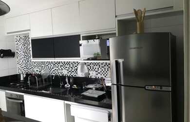 Imagem: O apartamento possui 2 Dormitórios, 1 Banheiro, 1 Vaga na garagem