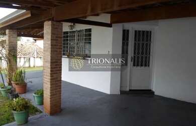 Imagem: A casa possui 3 Dormitórios, 3 Banheiros, 2 Vagas na garagem