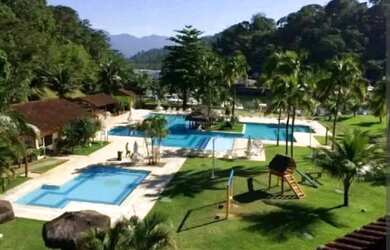 Imagem: A casa possui 2 Dormitórios e 2 Vagas na garagem e está localizado