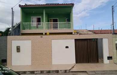 Imagem: A casa possui 5 Dormitórios, 2 Banheiros, 2 Vagas na garagem