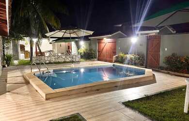 Imagem: A casa em condomínio possui 4 Dormitórios, 3 Banheiros, 5