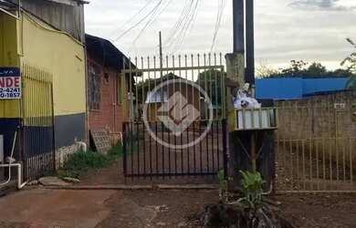 Imagem 1: Terreno grande com sala comercial na frente e casas de algueis codigo: 141486