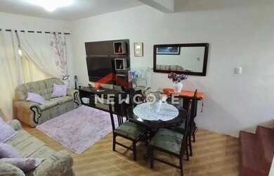 Imagem: A casa possui 3 Dormitórios, 2 Banheiros, 3 Vagas na garagem