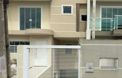 Imagem: A casa possui 3 Dormitórios, 3 Banheiros, 2 Vagas na garagem