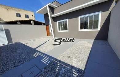 Imagem: A casa possui 3 Dormitórios, 2 Banheiros, 2 Vagas na garagem