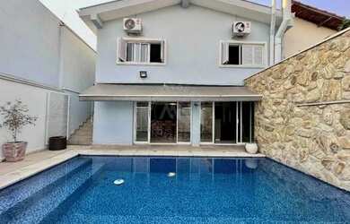 Imagem: A casa possui 3 Dormitórios, 4 Banheiros, 4 Vagas na garagem