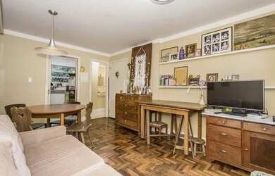 Imagem: O apartamento possui 2 Dormitórios, 1 Banheiro, 1 Vaga na garagem