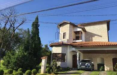 Imagem: A casa em condomínio possui 4 Dormitórios, 2 Banheiros, 4