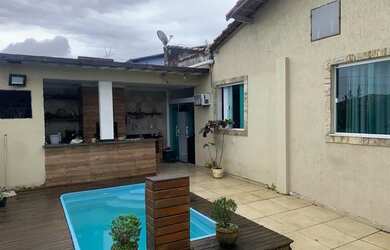 Imagem: A casa possui 3 Dormitórios, 2 Banheiros, 1 Vaga na garagem