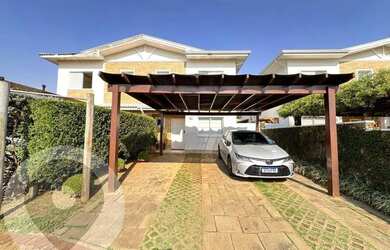 Imagem: A casa possui 3 Dormitórios, 4 Banheiros, 4 Vagas na garagem