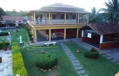 Imagem: A casa possui 5 Dormitórios, 5 Banheiros, 5 Vagas na garagem