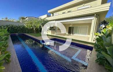 Imagem: A casa em condomínio possui 5 Dormitórios, 5 Banheiros, 4