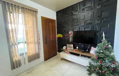 Imagem: A casa possui 2 Dormitórios, 2 Banheiros, 1 Vaga na garagem