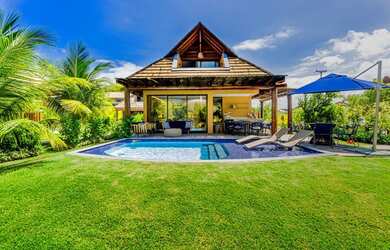 Imagem: A casa em condomínio possui 4 Dormitórios, 4 Banheiros, 2