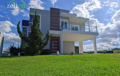 Imagem: A casa em condomínio possui 4 Dormitórios, 3 Banheiros, 2