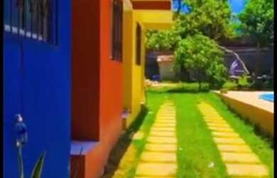 Imagem: A casa possui 1 Dormitório, 1 Vaga na garagem e está localizado