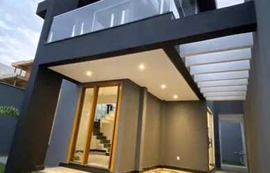 Imagem: A casa possui 3 Dormitórios, 2 Banheiros, 2 Vagas na garagem