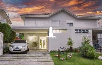 Imagem: A casa possui 3 Dormitórios, 4 Banheiros, 4 Vagas na garagem